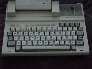 Note the six function keys across the top and the escape and reset buttons in the upper left corner.
